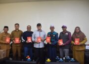 Bupati Ir. H. Tagore Abubakar Terima 100 Wakaf Al-Quran Dari BWA Untuk Masjid Terdampak Bencana Di Bener Meriah