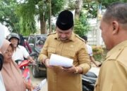 Tinjau Penyaluran Bantuan Jadup dan Stimulan Ekonomi di Kantor Pos Kota Kualasimpang, Ini Kata Bupati Armia Fahmi