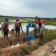 Babinsa Bersama Petani Periksa Pintu Air Demi Terpenuhi Air ke Sawah